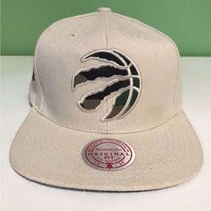 Toronto Raptors beige/camo adjustable snapback NBA hat (with NB initials)